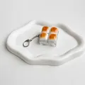 Primer plano detallado del llavero probador de interruptores de teclado de pan caramelo - Estilo de 4 Rejillas