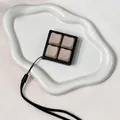 Stress relief 4-key mechanical keyboard switch tester keychain in a cute pink finish - Caramel Brown