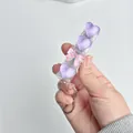 Macro view of heart-shaped keyboard switch tester keychain with pink bow ornament - No Light / Purple Heart Bow
