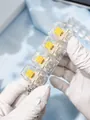 4-key mechanical keyboard switch tester keychain with clear caps and yellow stems - Square Keycaps / Yellow