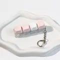 Stress-relieving 4-key mechanical keyboard switch tester keychain in pink and white - 4-Key Layout / Color Block - Sakura Pink White