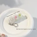 Mechanische toetsenbordschakelaar tester sleutelhanger met drie tactiele schakelaars - Vierkante keycaps / Sakura Soda (Gemengde Schakelaars)