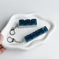 Detailaufnahme des Galaxy Sternenhimmel Keycap Fidget-Spielzeugs - 3-Tasten-Stil / Ohne Licht / Dunkelgrün