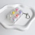 Porte-clés transparent à 6 cases avec interrupteurs de clavier mécanique colorés - Carrousel - couleurs et commutateurs mixtes