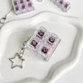 Transparent 4-key mechanical switch tester keychain with purple keys and star clasp - Four-Key Square Style