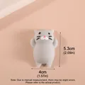 Λεπτομερής προβολή γκρι squishy γάτας με βάρος 13g και ύψος 5,3cm χαρακτηριστικά - Γκρι γάτα