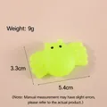 Details eines grünen Spinnen-Squishy-Spielzeugs mit 5,4 cm Breite und 9g Gewicht - Geist / Grün