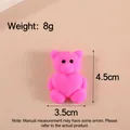 Λεπτομερής προβολή ροζ αρκουδάκι squishy με ύψος 4,5 cm και βάρος 8 g - Αρκουδάκι