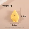Variante de jouet à presser jaune avec hauteur de 4,5 cm et spécifications de poids - Poire Jaune