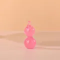 Detalle del juguete antiestrés de calabaza luminosa rosa translúcido - Rosa
