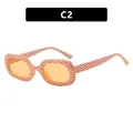 Stylish retro oval sunglasses featuring orange zigzag pattern frames and tinted lenses - One Size / Orange White Wavy (C2)