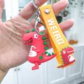 Mignon porte-clés dinosaure rouge 3D avec lanière jaune WEIRD en PVC souple pour sac - Dinosaure Tenant son Ventre / Rouge