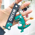 Porte-clés dinosaure vert mignon avec sangle noire Weird en caoutchouc PVC souple - Dinosaure Tenant son Ventre / Vert foncé