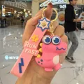 Porte-clés dinosaure rose mignon en PVC avec lanière RUN FAST pour sacs et voitures - Dinausore mignon / Rose