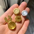 Set koperen vlindersluitingen voor speldjes in 18K goud en zilver, 15 mm en 17,5 mm - 15mm / Concaaf Koperen Blank