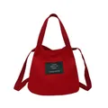 Stylish red canvas mini bucket bag for women with cross-body strap and hand strap. - Red