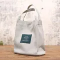 Japanese style minimalist cream canvas bucket handbag with green letter patch detail - Light Gray