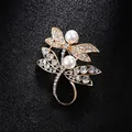 Elegant gold dragonfly brooch accented with white pearls and sparkling rhinestones. - Double Dragonfly Artificial Pearl Style (XD8107) / Gold