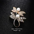 Elegant gold dragonfly brooch accented with white pearls and sparkling rhinestones. - Double Dragonfly Artificial Pearl Style (XD8107) / Gold