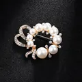 Elegant gold-plated pearl and crystal wreath brooch pin for formal suits and dresses. - Artificial Pearl Bow Half Ring Style (XD8794) / Gold