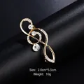 Elegant gold G-clef musical note brooch with sparkling clear crystals for suit lapels - G-Clef Musical Note Style (XD9114) / Gold