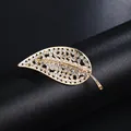 Elegant gold-tone leaf brooch adorned with sparkling white crystals for women - Hollow Leaf Style (XD9118) / Gold