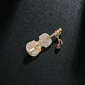 Elegant gold violin brooch with clear rhinestones and purple musical note pendant charm. - Violin and Music Note Style (XD7981) / Gold