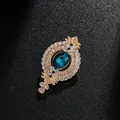 Vintage gold-tone oval brooch with large blue gemstone and sparkling rhinestones - Vintage Oval Gem Style (XD9080) / Gold