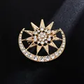 Elegant gold-toned sun and moon brooch encrusted with sparkling clear rhinestones - Star and Moon Style (XD9268) / Gold