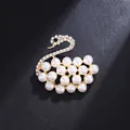 Elegant gold-tone swan brooch featuring white pearls and sparkling rhinestones, 14.3g - Full Rhinestone Artificial Pearl Swan Style (XD823104) / Gold