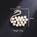 Elegant gold-tone swan brooch featuring white pearls and sparkling rhinestones, 14.3g - Full Rhinestone Artificial Pearl Swan Style (XD823104) / Gold