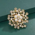 Elegant gold flower brooch decorated with white pearls and sparkling crystal rhinestones - Floral Snowflake Style (XD11405-1) / Gold