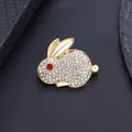 Elegant golden rabbit brooch with sparkling crystals and red eye for suits and dresses - Rabbit Shape Style (XD823002) / Gold