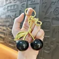 Elegant black glitter cherry keychain with golden leaf charm for women bag decoration - 3cm / Black Gold Rod