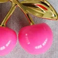 Vibrant pink cherry bag charm keychain featuring gold leaf detail on textured grey fabric - 3cm / Rose Red Gold Rod