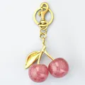 Elegant pink glitter cherry keychain with gold leaf charm for ladies bag and car keys - 2.6cm / Transparent Pink