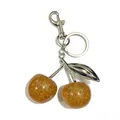 Amber glitter cherry keychain with silver metal leaf and lobster clasp - 3cm / Transparent Yellow Silver Rod