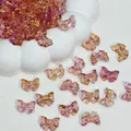Macro view of 14x10mm colorful glass bow beads for handmade jewelry DIY crafts - Purple-Gold