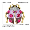 Vintage purple enamel beetle brooch with pink rhinestones and gold finish detail - Ancient Gold / Purple