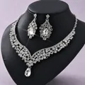 Glamorous silver rhinestone necklace and matching earrings set with pear-shaped crystals - Silver Necklace and Earrings Set (NS-J6503S)