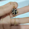 Colgante de huevo ruso abrible en esmalte negro con circonitas y amuleto de ángel - Estilo Colgante Ángel Diamante Negro (17)