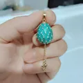 Colgante de huevo de Pascua ruso en esmalte azul con rejilla dorada y piedras circonitas - Estilo Colgante Cisne Rombos Cián (16)