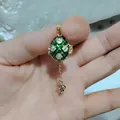 Colgante de huevo de esmalte verde estilo ruso con piedras blancas y amuleto elefante - Estilo Colgante Elefante Cuadrícula Verde Dorado (21)