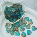 Detailed macro shot of textured heart-shaped blue and brown lampwork glass beads - L634# Dawn Blue