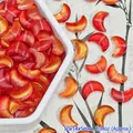 Macro view of red moon-shaped glass beads with gold foil for DIY jewelry making. - Gold Red