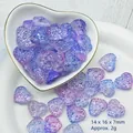 Dettaglio ravvicinato di perle di vetro viola a forma di cuore per la creazione di gioielli - L636# Blu Viola