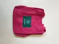 Simple magenta canvas bucket bag with sturdy handles and contrast green label detail - Burgundy