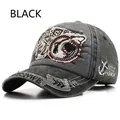 Detailed view of a grey washed baseball cap featuring a large shark embroidery - Adjustable / Black