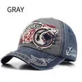 Close-up of washed baseball cap with detailed shark embroidery in grey and blue - Adjustable / Gray