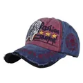 Close-up detail of a vintage washed cotton baseball cap with red and blue embroidery and stars. - Adjustable / Navy Blue